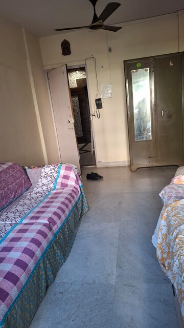 Bedroom in 1 BHK Apartment at Satellite Garden, Goregaon East – for Rent