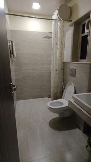 Bathroom in 3 BHK Apartment at Group Seven Rushi Heights, Goregaon East – for Rent