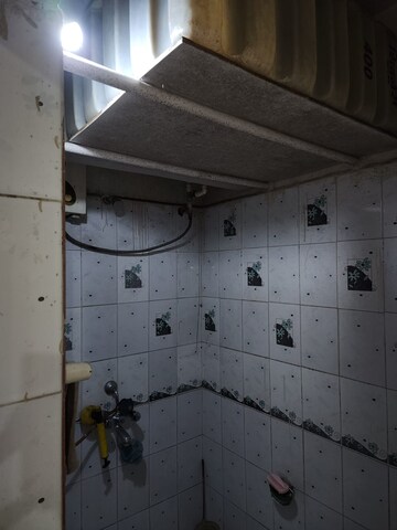 Bathroom in 2 BHK Apartment at Sudhir Krishnakala CHS, Dahanukar Colony – for Rent