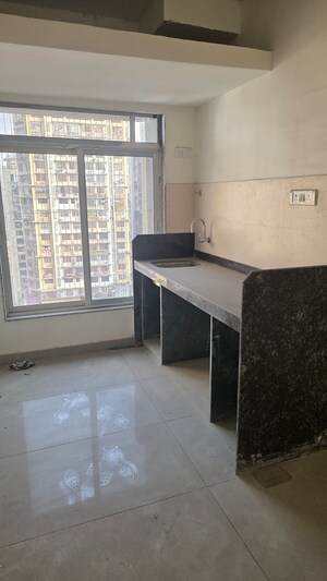 Kitchen in 1.5 BHK Apartment at Limra Burj Qadri, Agripada – for Sale