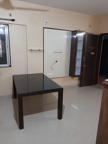 Living Room in 2 BHK Apartment at Woodland Avenue, Kothrud – for Rent