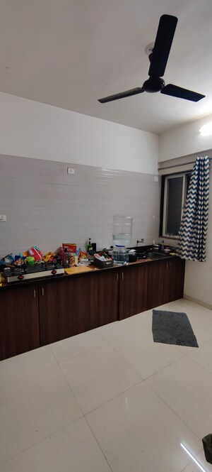 Kitchen in 2 BHK Apartment at Nirman Altius, Kharadi – for Rent