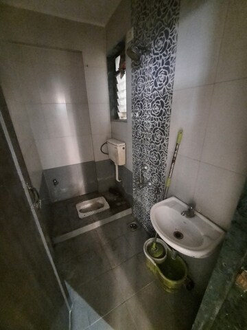 Bathroom in 1 BHK Apartment at Arihant Plaza CHS, Owale – for Rent