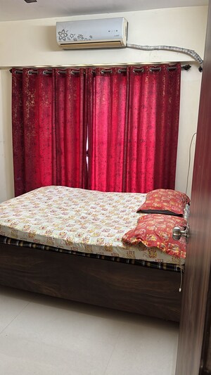 Bedroom in 2 BHK Apartment at Abrol Avirahi Heights, Malad West – for Rent