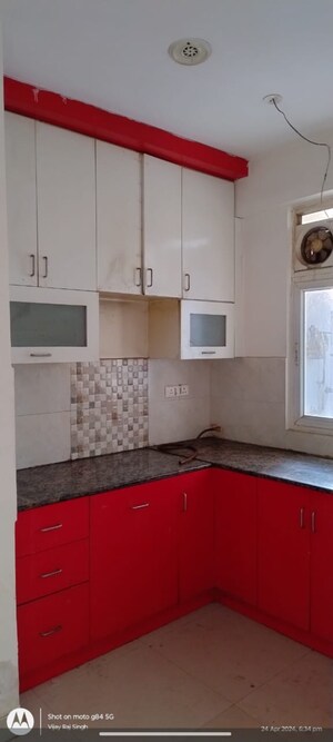 Kitchen in 2 BHK Apartment at AFOWO Raksha Addela, Sector 16c Greater Noida – for Rent