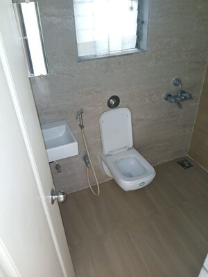 Bathroom in 2 BHK Apartment at Cosmos Jewels, Ghodbunder Road – for Rent