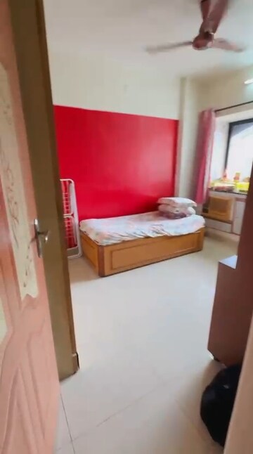 Bedroom in 2 BHK Apartment at Satellite Garden, Goregaon East – for Rent