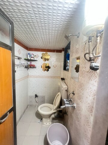 Bathroom in 2 BHK Apartment at Galaxy Classique, Goregaon West – for Rent