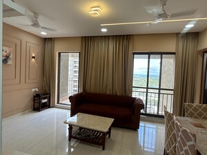 Living Room in 2 BHK Apartment at Pride World City, Charholi Budruk – for Sale