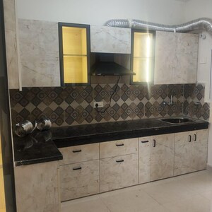 Kitchen in 2 BHK Apartment at Signature The Millennia 3, Sector 37d – for Rent