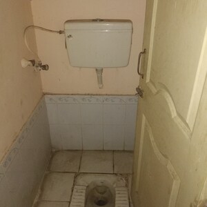 Bathroom in 1 BHK Apartment at New Mhada Tower, Malad West – for Rent