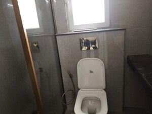 Bathroom in 3 BHK Apartment at Smart World Orchard, Sector 61 – for Rent
