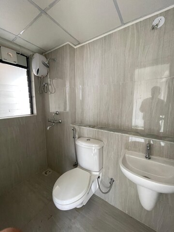 Bathroom in 2 BHK Apartment at Runwal Gardens Phase I, Dombivli East – for Rent