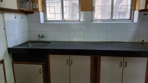 Kitchen in 2 BHK Apartment at Shatatarka Apartment, Karve Nagar – for Rent