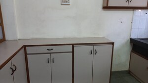 Kitchen in 2 BHK Apartment at Shatatarka Apartment, Karve Nagar – for Rent