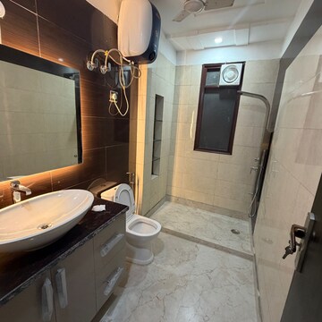 Bathroom in 4 BHK Builder Floor at Kailash Colony – for Sale
