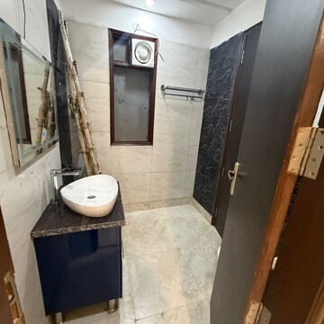 Bathroom in 4 BHK Builder Floor at Kailash Colony – for Sale