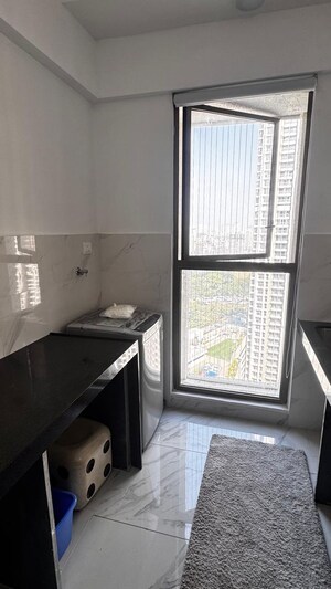 Kitchen in 2 BHK Apartment at Raymond Ten X Habitat, Pokhran Road No Two – for Rent