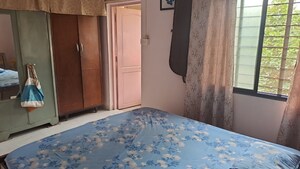Room in 2 BHK Apartment at Ganga Puram CHS, Viman Nagar – for Rent