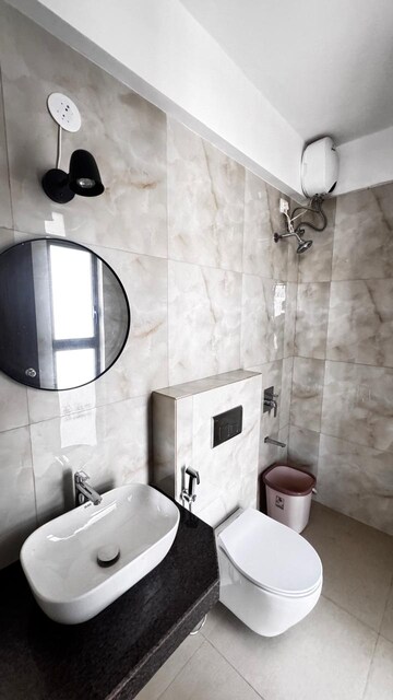 Bathroom in 2 BHK Apartment at Raymond Ten X Habitat, Pokhran Road No Two – for Rent