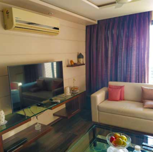 Living Room in 1 BHK Apartment at Manju Tower CHS, Lokhandwala Complex – for Rent