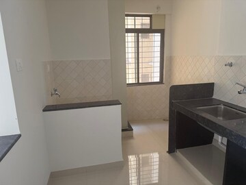 Kitchen in 2 BHK Apartment at Amit Colori, Undri – for Sale