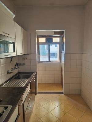 Kitchen in 2 BHK Apartment at Bredco Viceroy Court, Kandivali East – for Rent