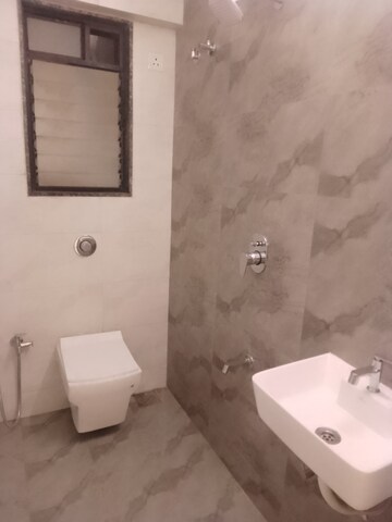 Bathroom in 1 BHK Apartment at Darshan Phoenix Tower, Kandivali East – for Sale