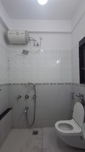 Bathroom in 3 BHK Apartment at Bredco New Viceroy Park , Kandivali East – for Rent