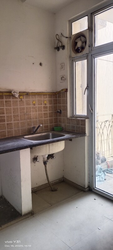 Kitchen in 2 BHK Apartment at Mahagun Mywoods, Sector 16c Greater Noida – for Rent