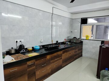 Kitchen in 2 BHK Apartment at Bhandari 32 Pinewood Drive, Hinjewadi – for Rent