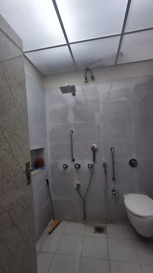 Bathroom in 3 BHK Apartment at Bredco New Viceroy Park , Kandivali East – for Sale