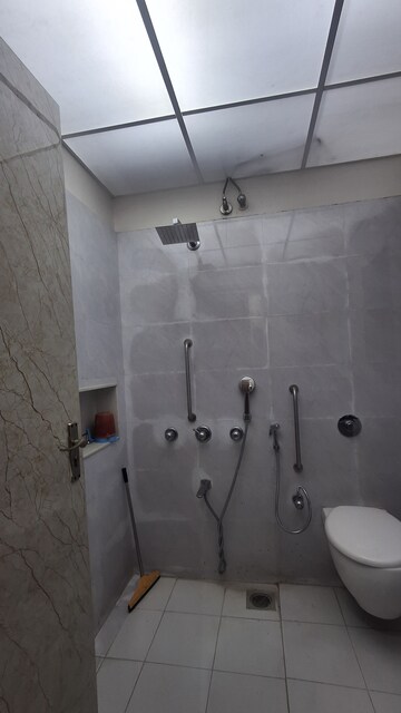 Bathroom in 3 BHK Apartment at Bredco New Viceroy Park , Kandivali East – for Sale