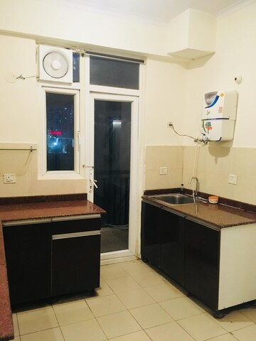 Kitchen in 3 BHK Apartment at Amrapali Crystal Homes, Sector 76 – for Sale