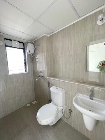 Bathroom in 1 BHK Apartment at Runwal Gardens Phase I, Dombivli East – for Rent