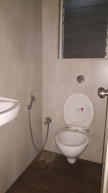 Bathroom in 1 BHK Apartment at VR Bhoomi Acres H wing, Waghbil – for Rent