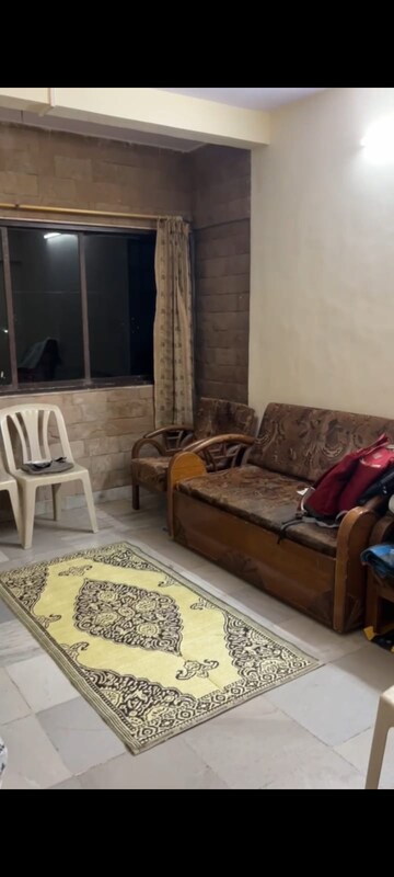 Living Room in 1 BHK Apartment at Kirit CHS, Malad West – for Rent