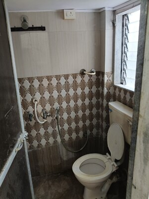 Bathroom in 1 BHK Apartment at Sai Nagar Seva CHS, Andheri West – for Rent