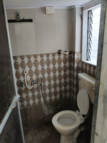 Bathroom in 1 BHK Apartment at Sai Nagar Seva CHS, Andheri West – for Rent