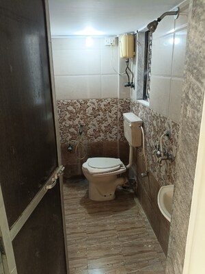 Bathroom in 1 BHK Apartment at Sai Nagar Seva CHS, Andheri West – for Rent