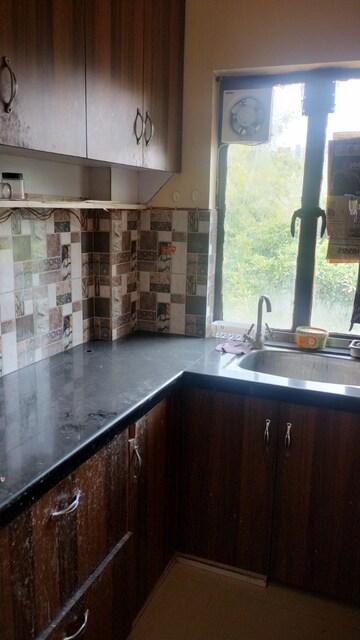 Kitchen in 1 RK Apartment at Vipul Belmonte, Sector 53 – for Rent