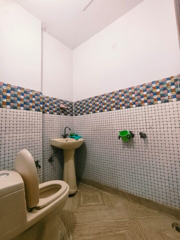 Bathroom in 3 BHK Builder Floor at Dwarka Mor – for Sale