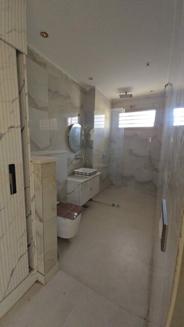 Bathroom in 4 BHK Builder Floor at Green Fields Colony – for Rent