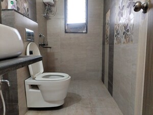 Bathroom in 2.5 BHK Apartment at Jangid Galaxy, Ghodbunder Road – for Rent