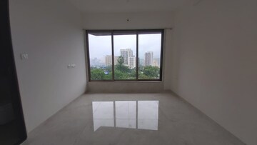 Room in 2 BHK Apartment at Rustomjee Riviera, Malad West – for Rent