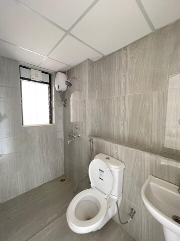 Bathroom in 1 BHK Apartment at Runwal Gardens Phase I, Dombivli East – for Rent