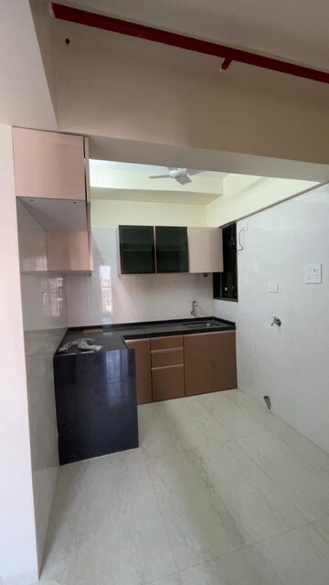 Kitchen in 2 BHK Apartment at Pratham ARC Aura, Andheri West – for Rent