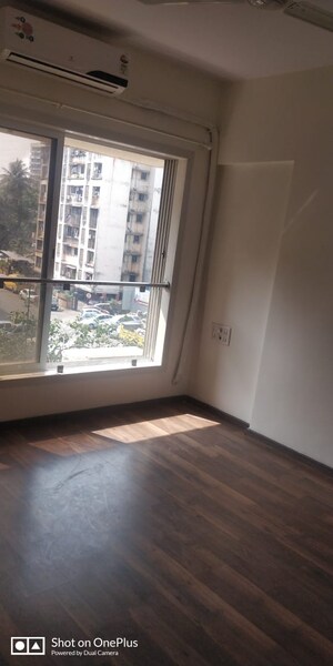 Room in 2 BHK Apartment at Romell Diva, Malad West – for Rent