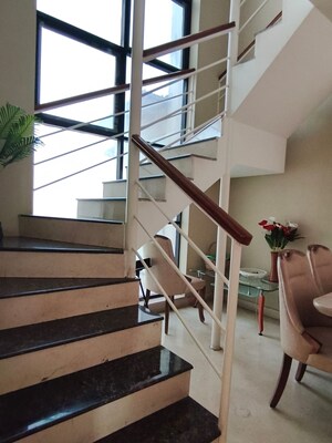 Staircase in 4 BHK Apartment at Brahma Emerald County, Kondhwa – for Sale