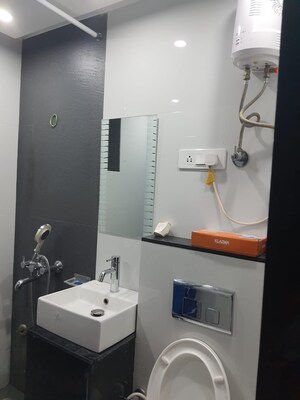 Bathroom in 3 BHK Apartment at Vidyut Apartment, Sector 12 Dwarka – for Rent